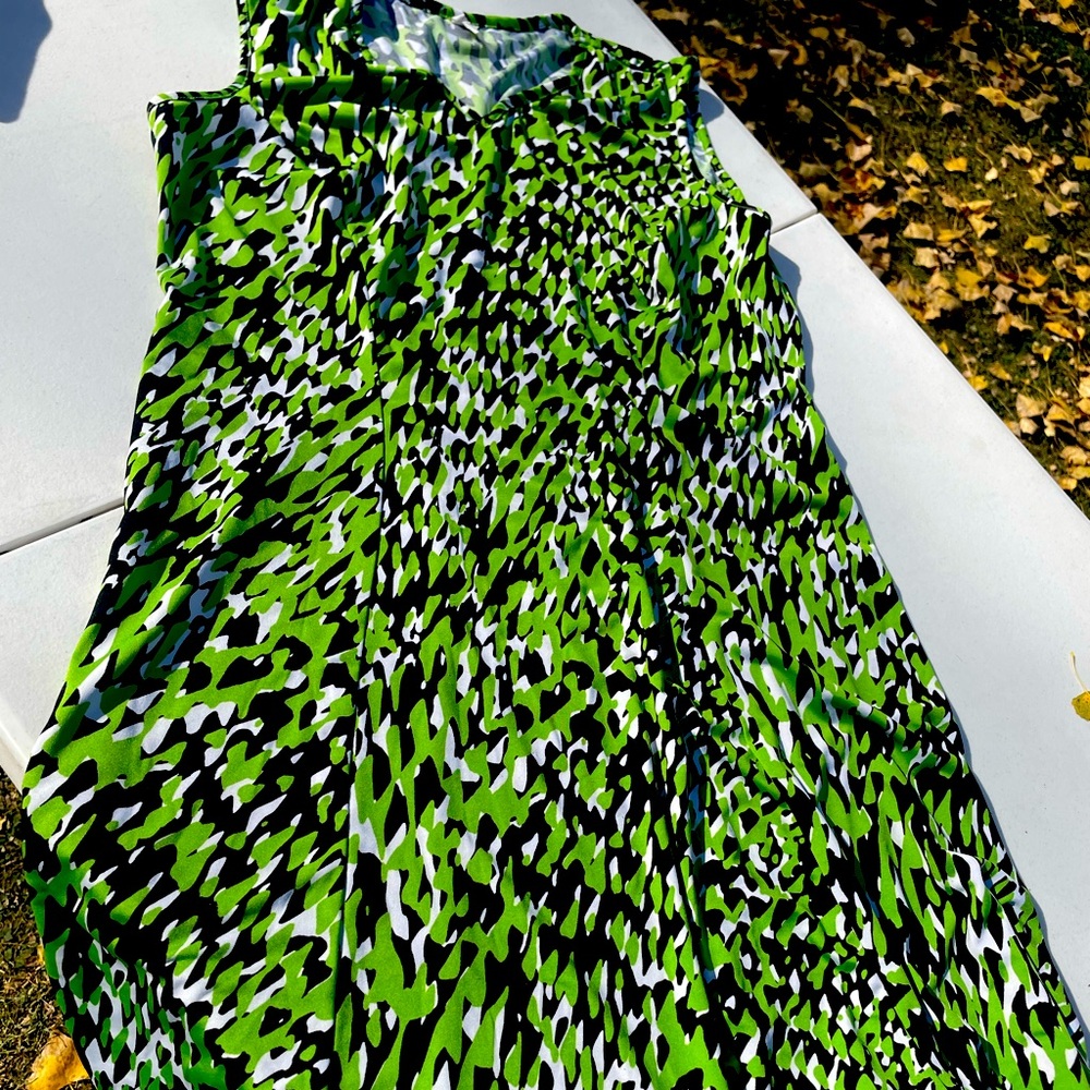 2 dresses from Target. The solid green one is medium, and the other is a 14p